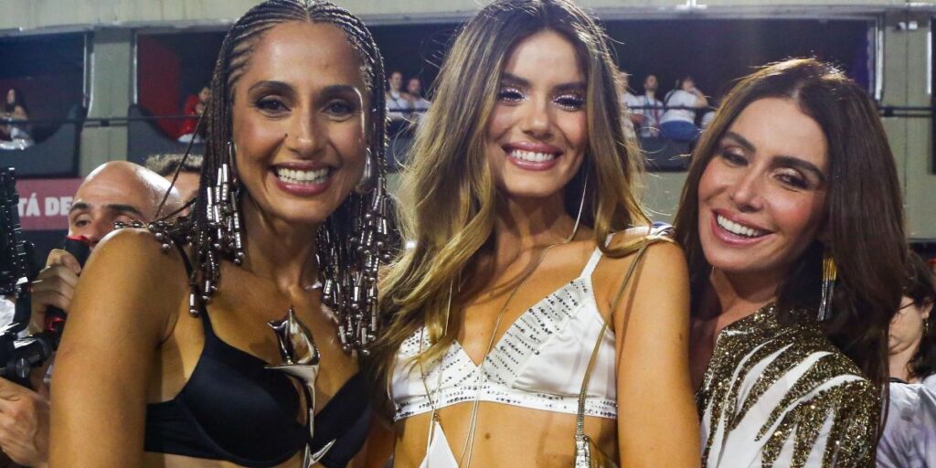 "Beleza Fatal" no Carnaval: trio protagonista curte 1º dia de Sapucaí